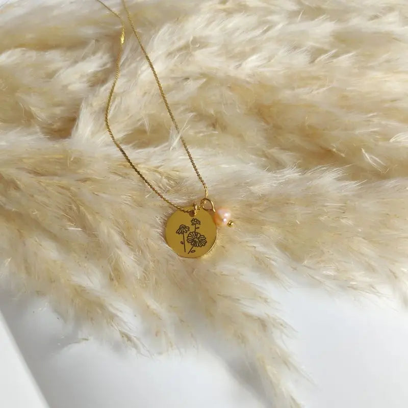Pendentif fleur de naissance avril